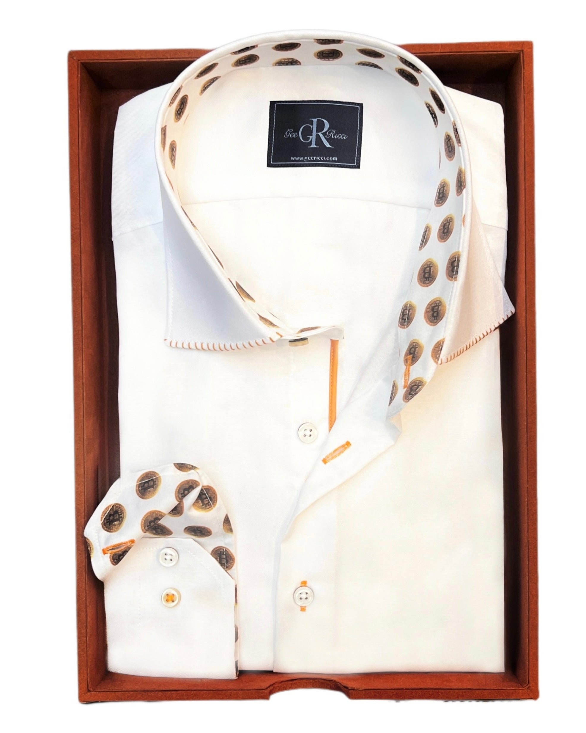 White shirt with patterned collar and cuffs in a wooden box, featuring a visible brand logo.