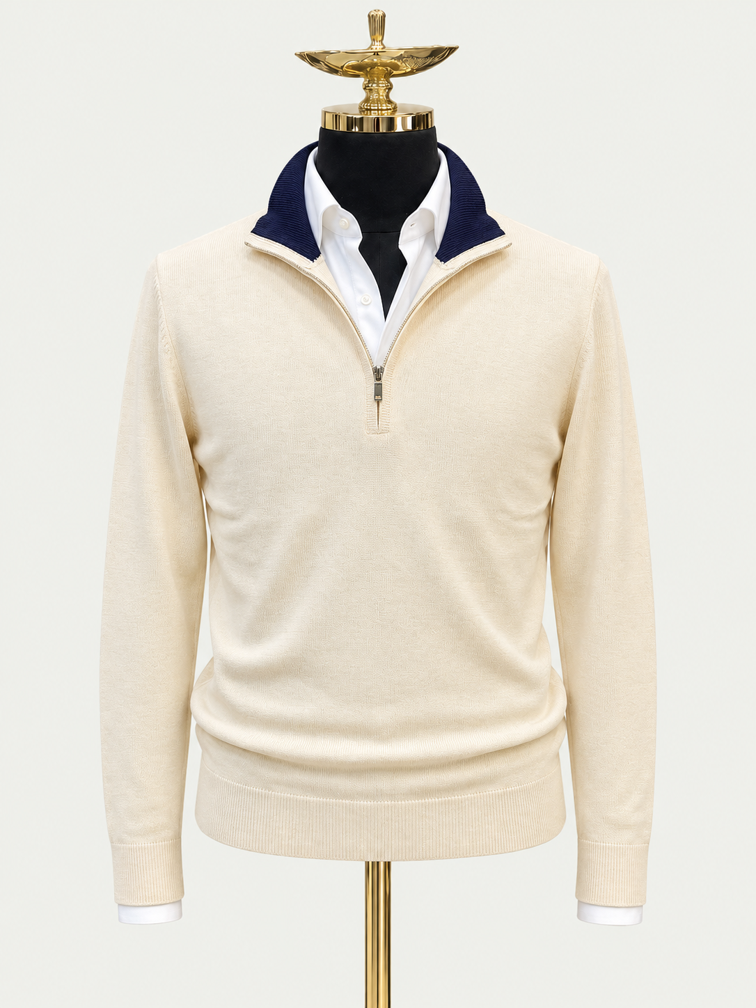 Cream Midnight on gold mannequin against pale grey background