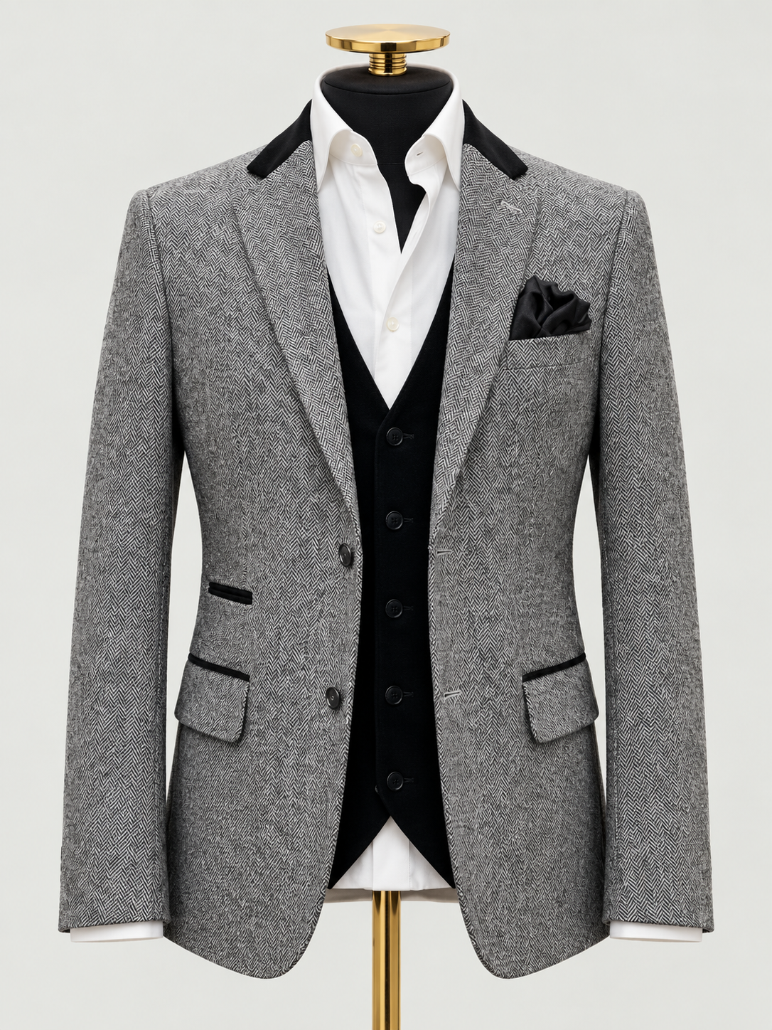 Grey Herringbone Blazer on black mannequin with gold neck cap