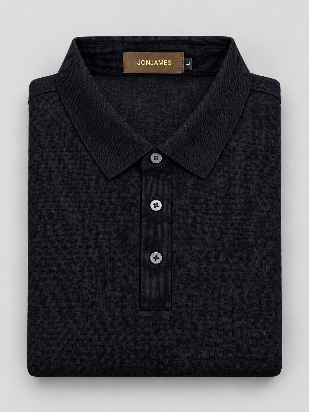 JONJAMES long sleeve three-button jacquard polo folded on pale grey background
