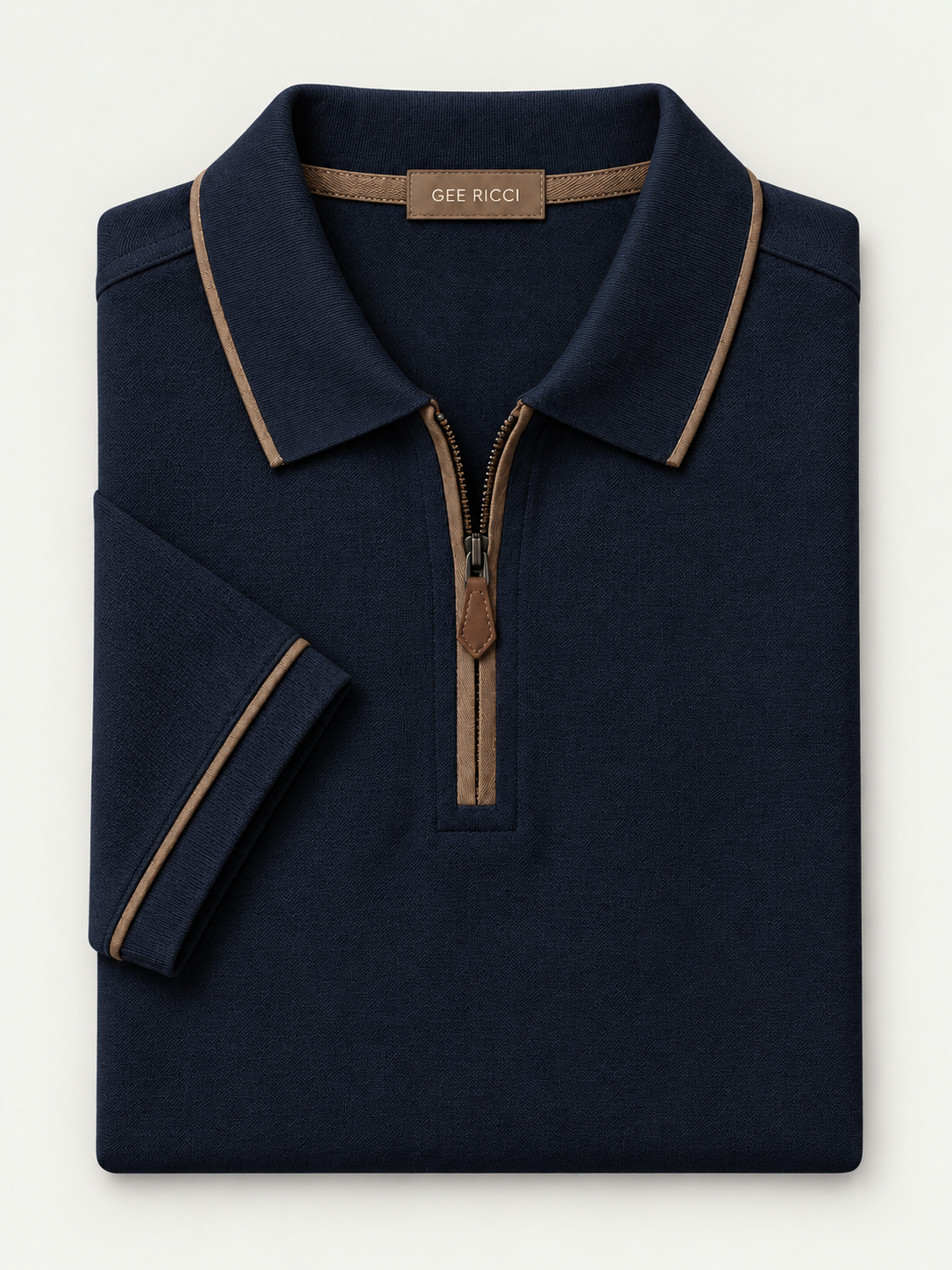 Midnight Riviera Performance Polo folded on pale grey background