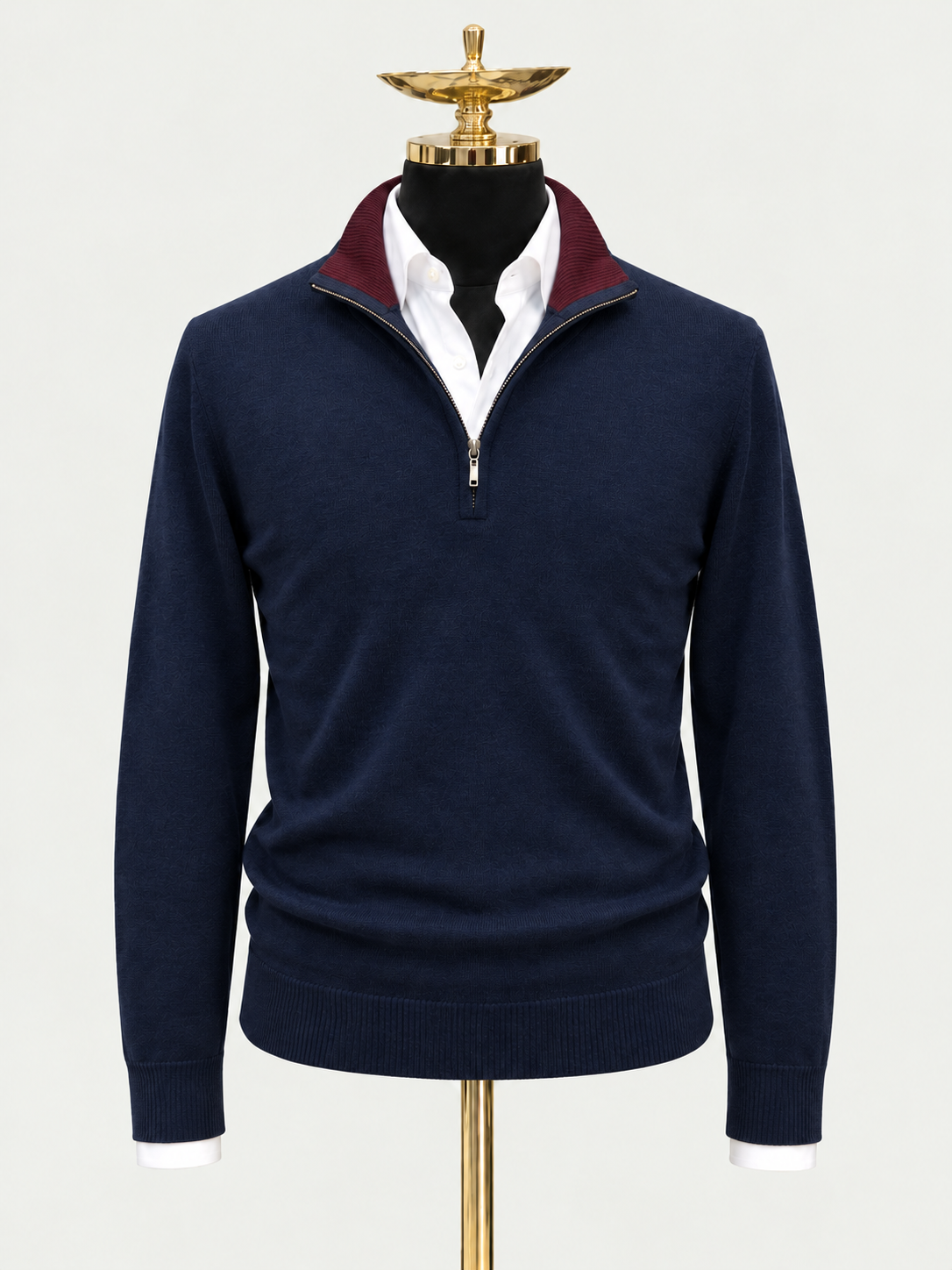 Midnight Merlot on a gold mannequin with a pale grey background