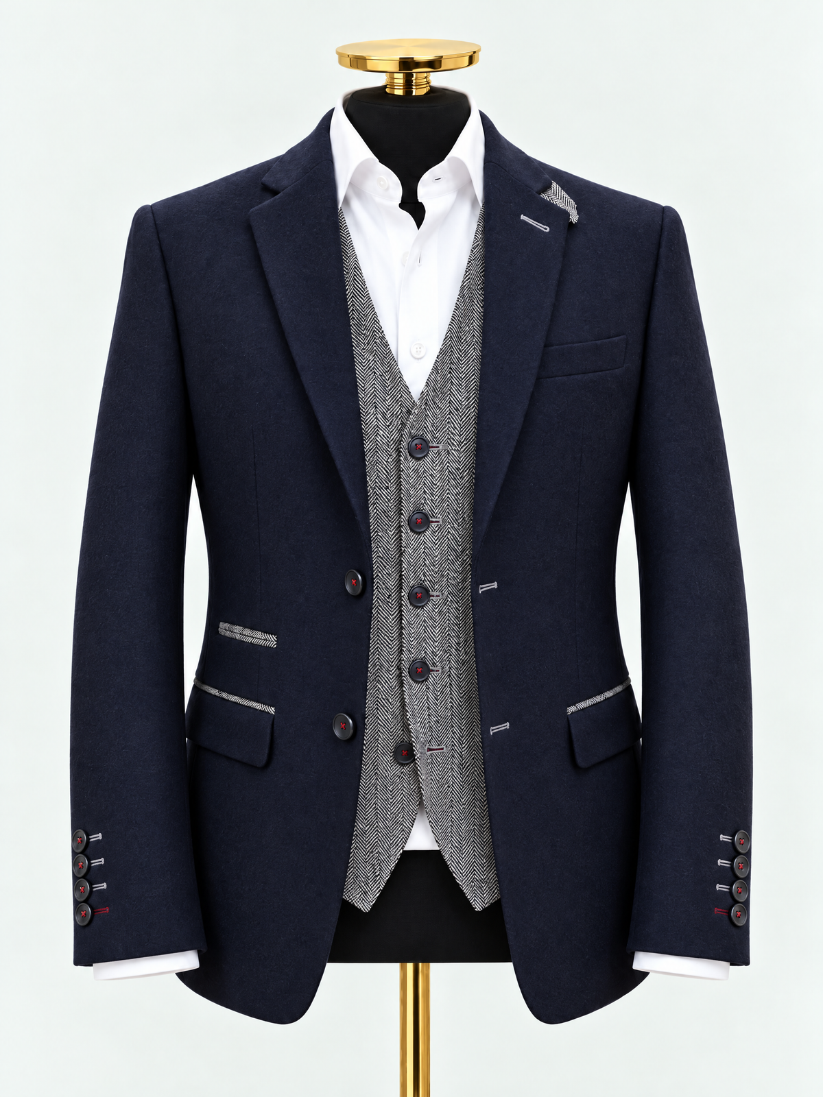 Midnight navy wool and cashmere blazer with grey herringbone waistcoat and white shirt on black mannequin with gold stand