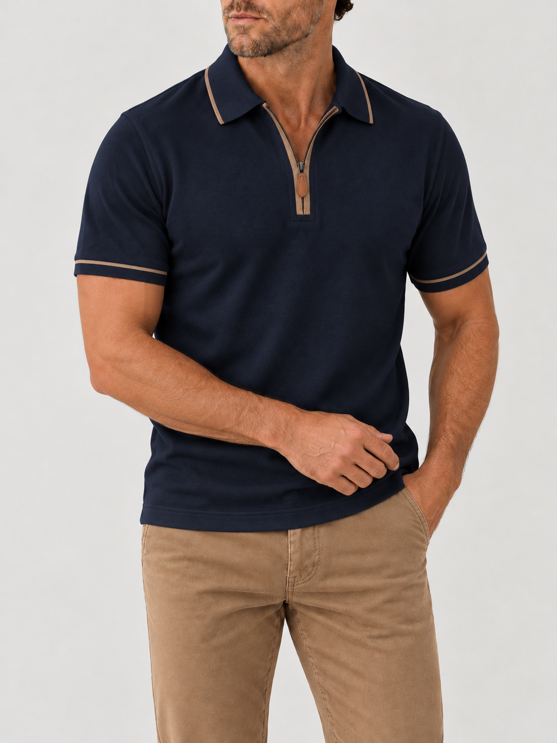 Midnight Riviera Performance Polo on model against pale grey background