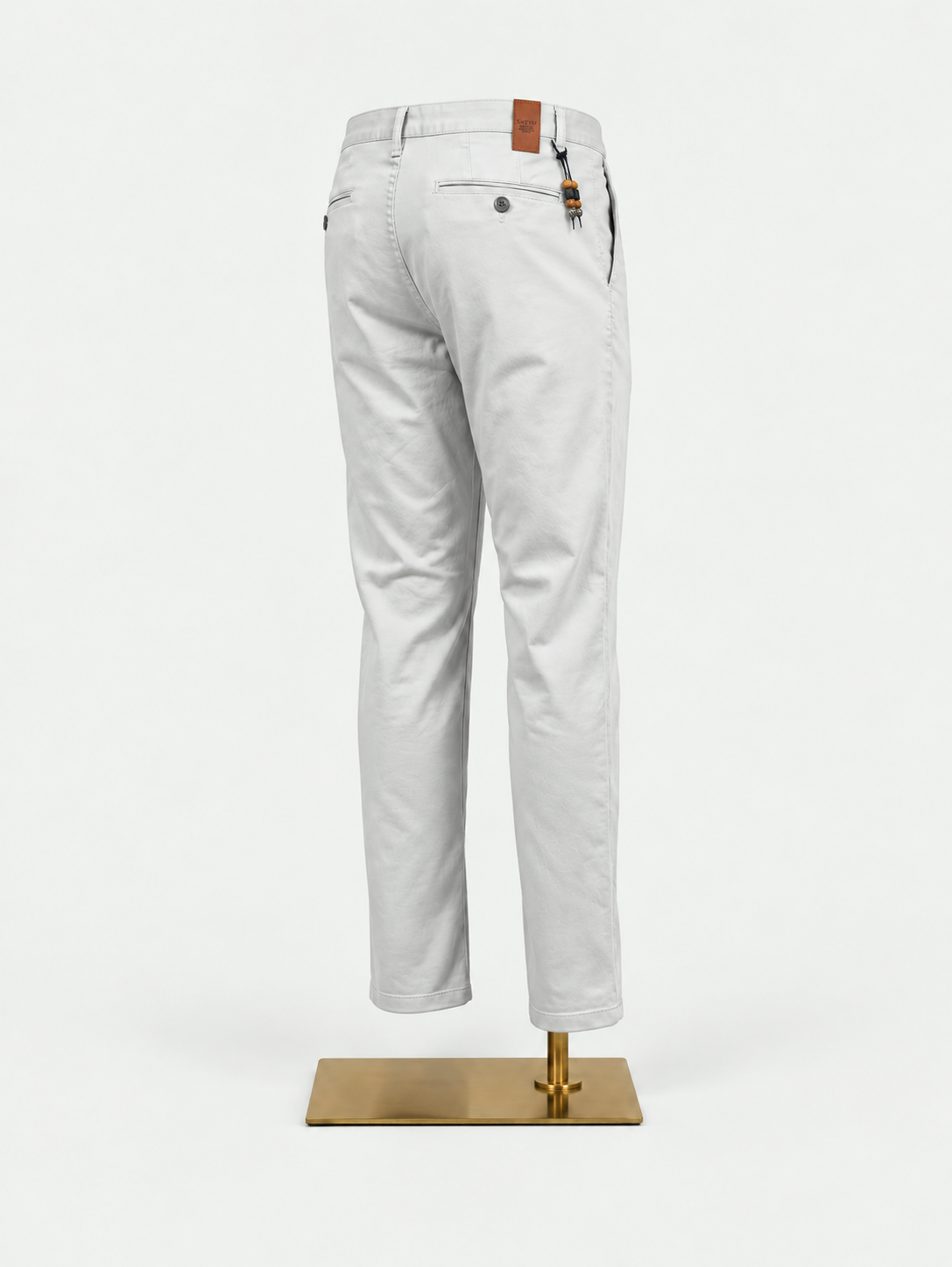Birdseye Pearl Chinos on gold mannequin stand