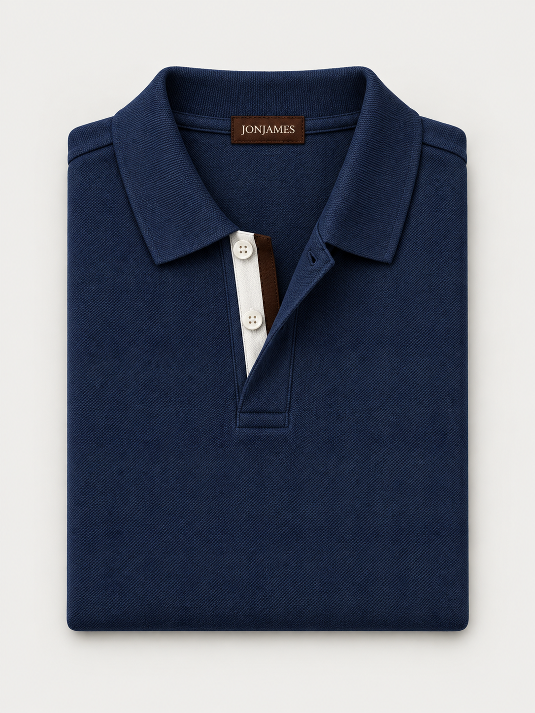 Navy Piqué Polo - Long Sleeve - Regular Fit folded on pale grey background