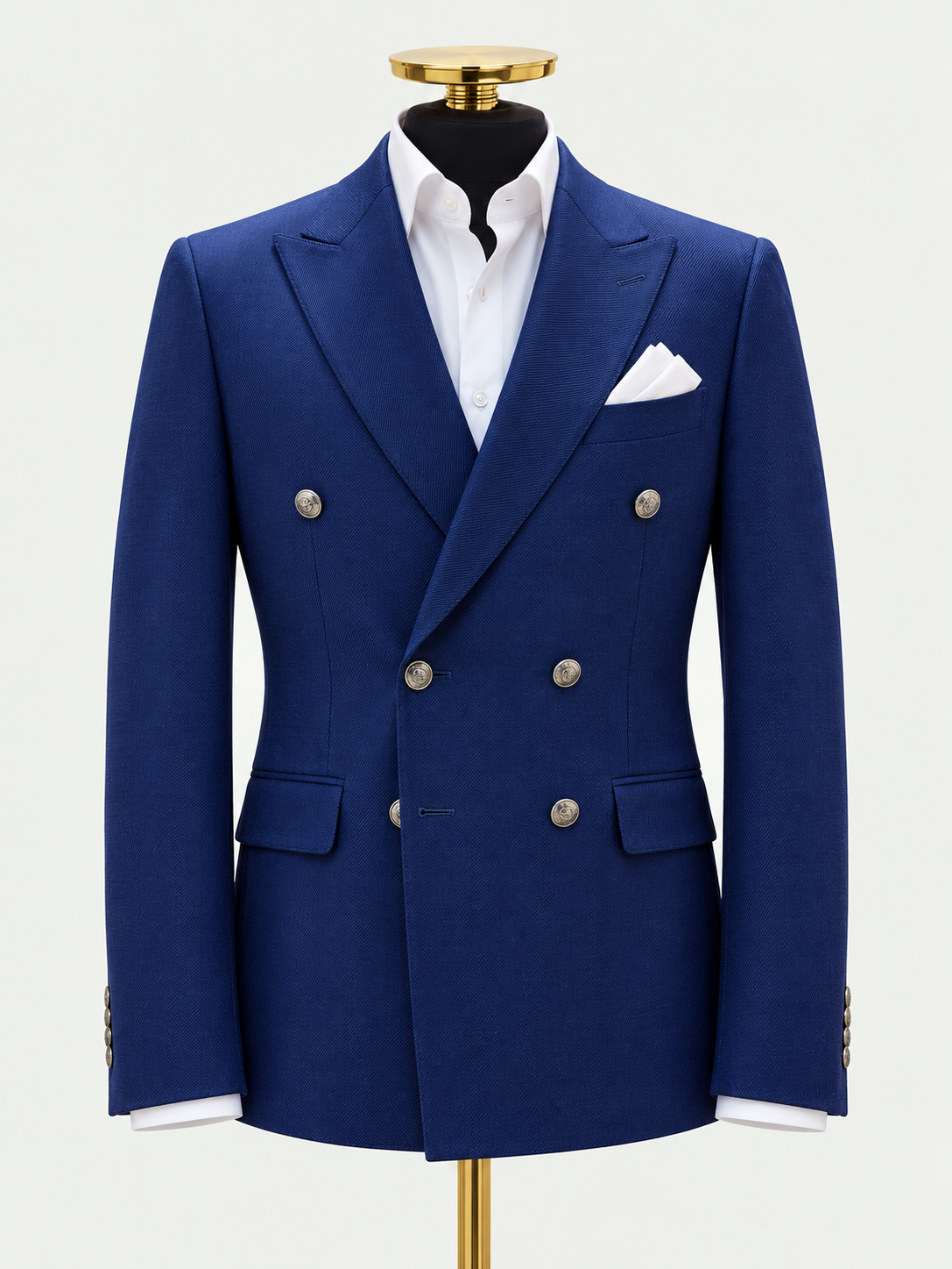 Regent Double-Breasted Navy Wool Blazer on a black mannequin against a pale grey background