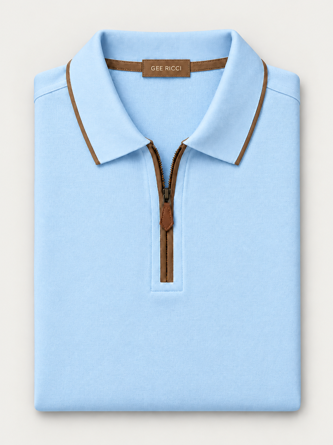 Sky Riviera Performance Polo folded on pale grey background