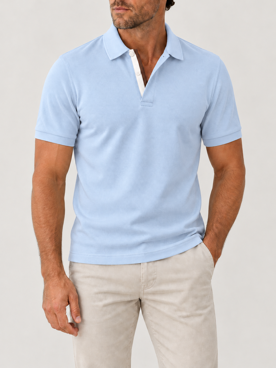 Sky Piqué Polo - Short Sleeve - Regular Fit on model against pale grey background