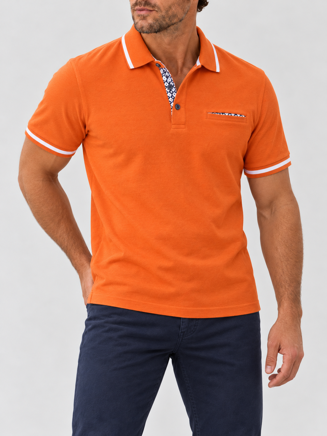Sunset Riviera Egyptian Cotton Polo on model against pale grey background
