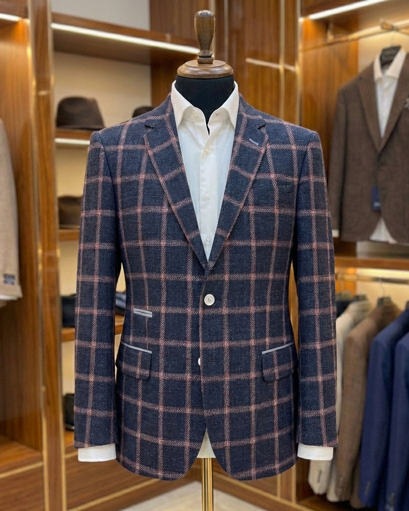 Plaid suit jacket on a mannequin in a clothing store setting