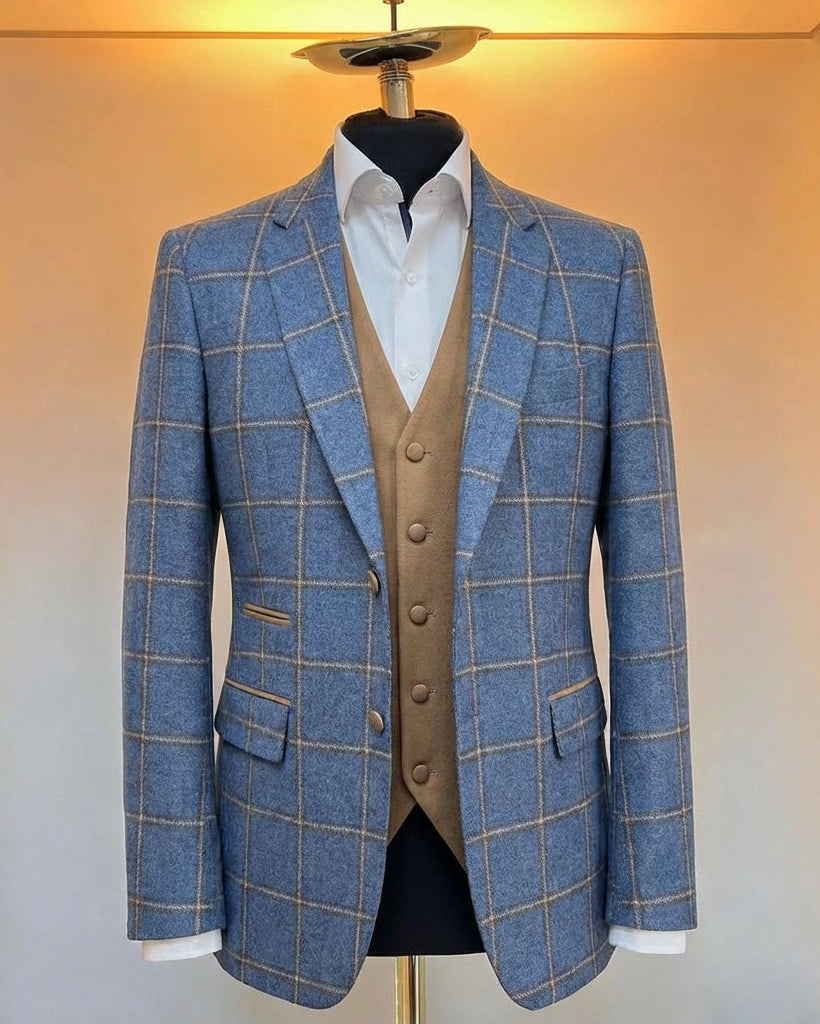 Blue checkered suit jacket with a vest on a mannequin against a neutral background