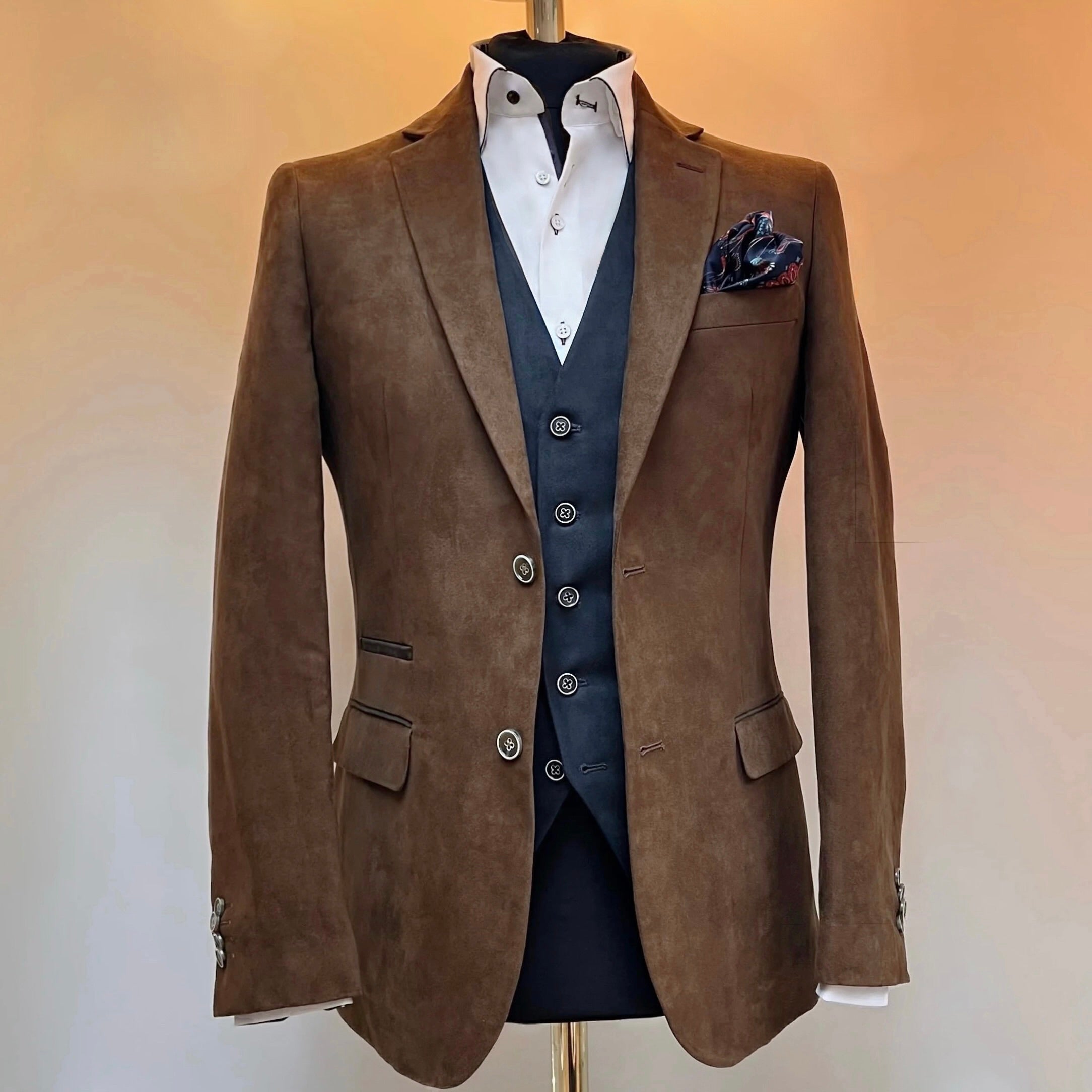 A rich Cognac Brown Alcantara — warm, refined, and suede-like in texture and navy waistcoat.