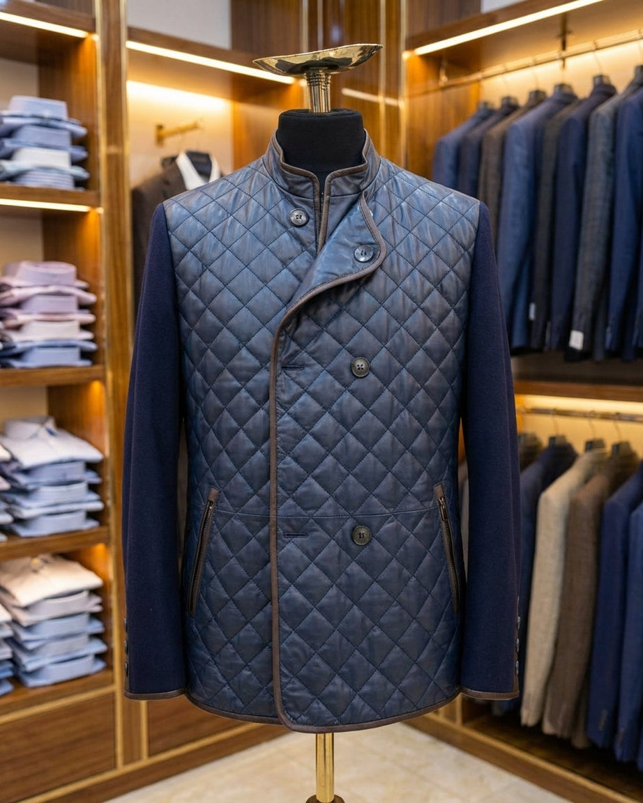 Blue quilted jacket on a mannequin in a clothing store setting