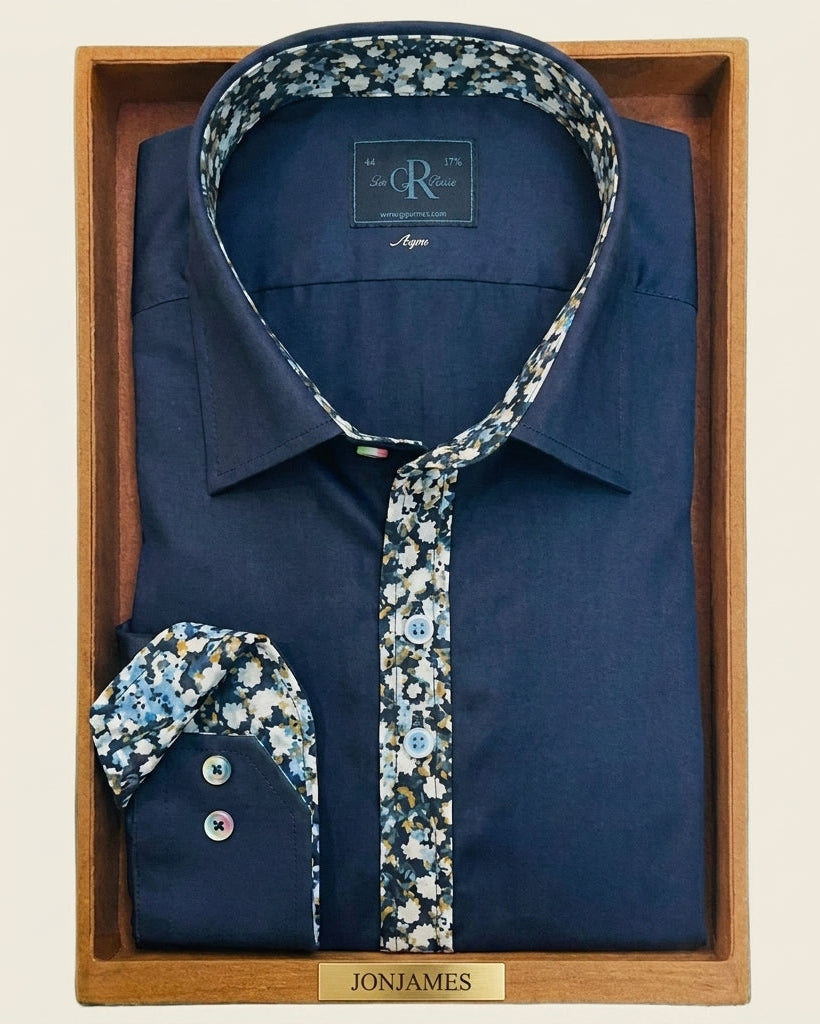Navy shirt with floral accents in a wooden box, featuring the brand 'JonJames'.