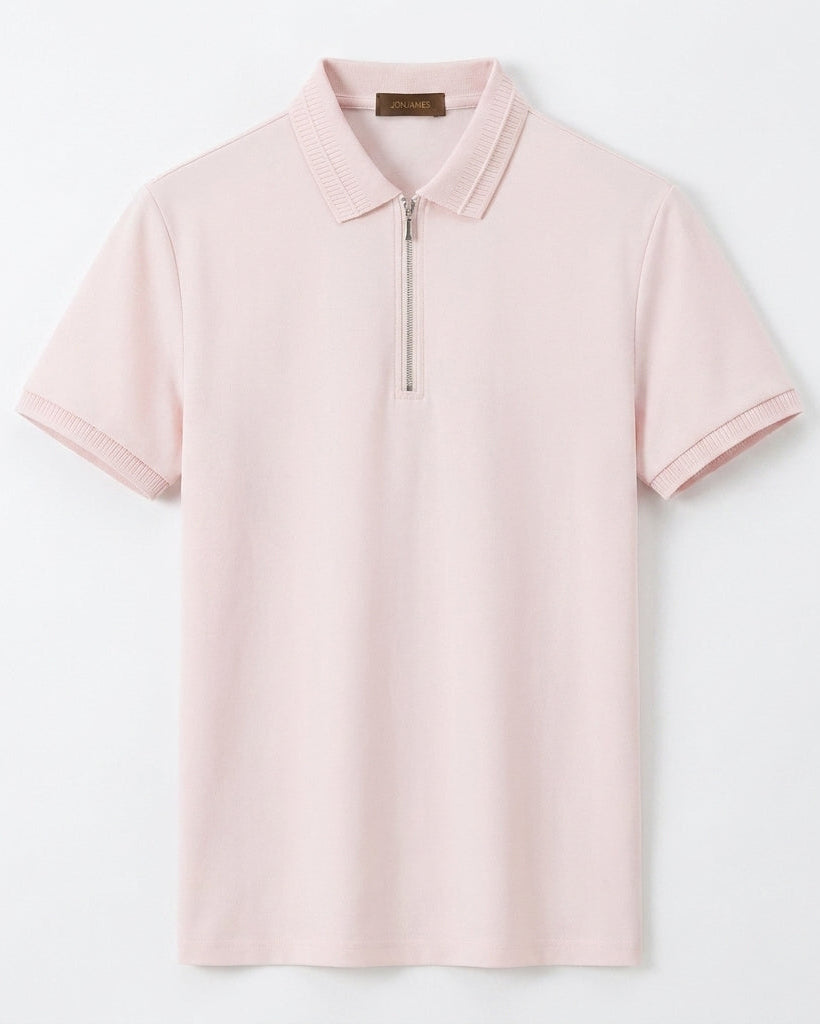 Pink polo shirt with a zipper on a light gray background