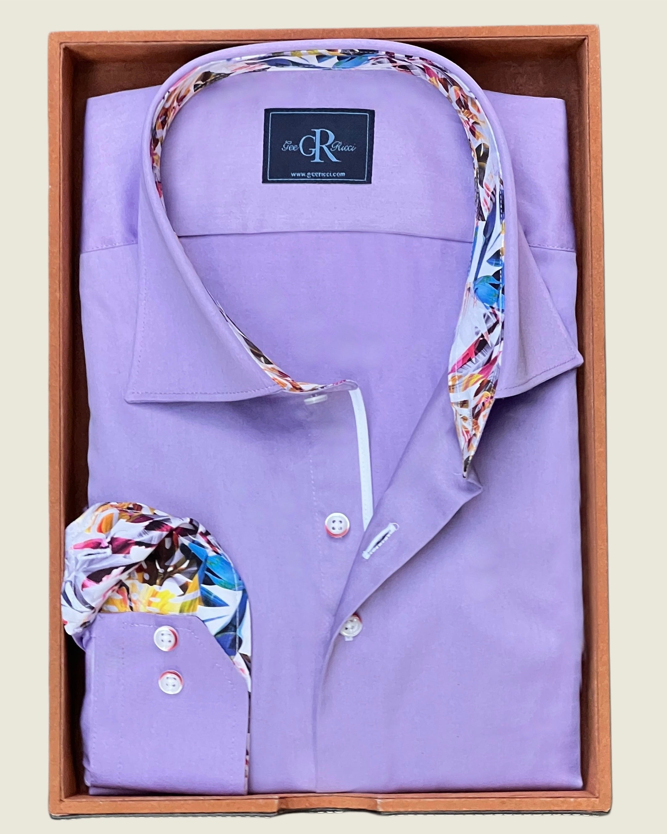 Purple dress shirt with floral pocket square and collar in a wooden box, featuring a visible brand label.
