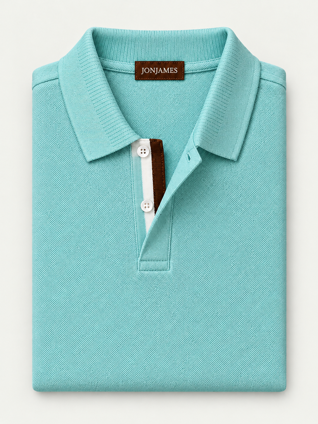 Aqua Piqué Polo - Short Sleeve - Regular Fit folded on pale grey background