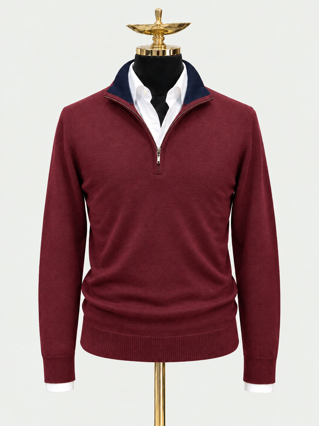 Crimson Tide on a gold mannequin with a pale grey background