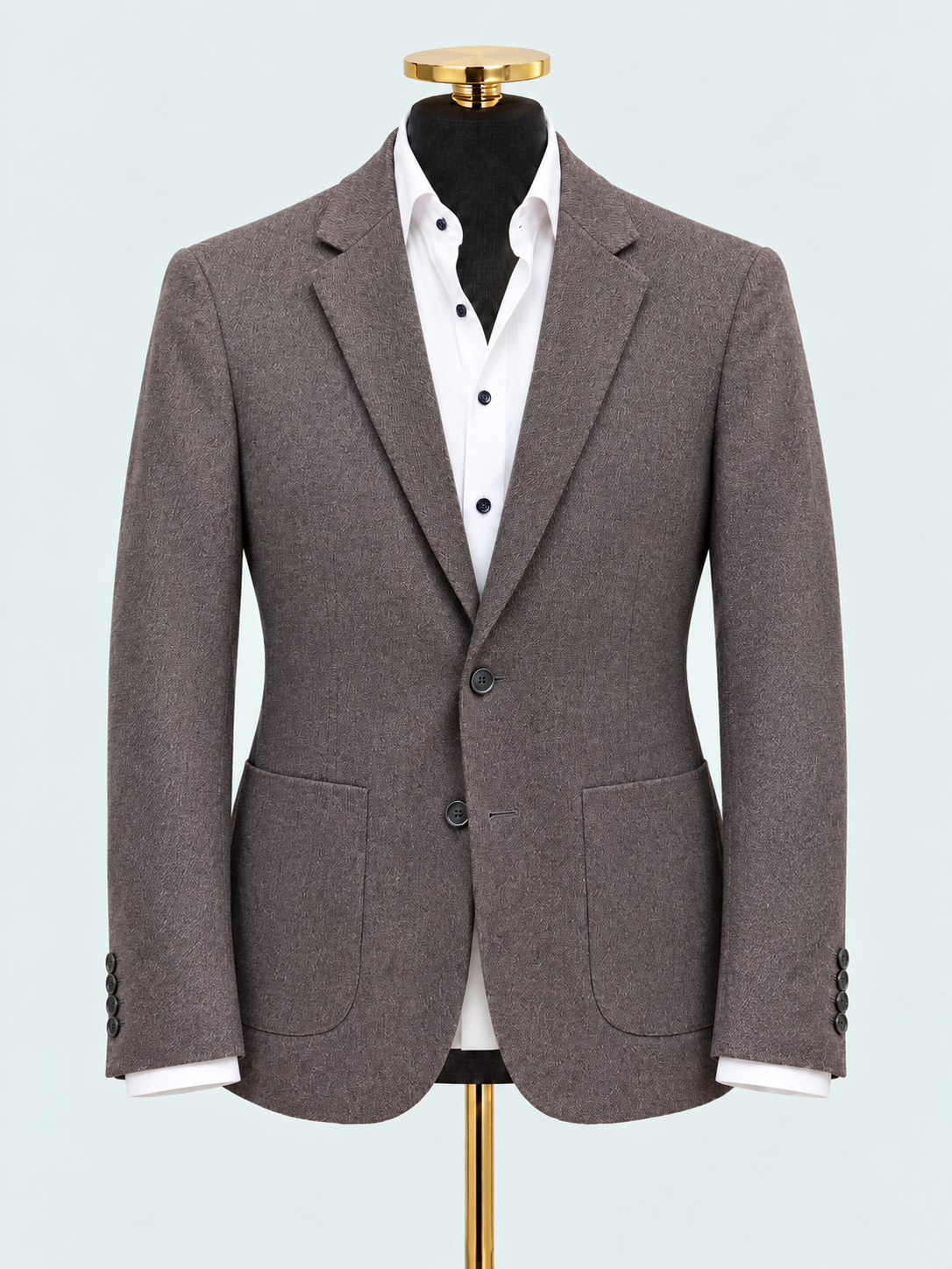 Mocha Monte Carlo blazer on a black and gold mannequin with a white shirt