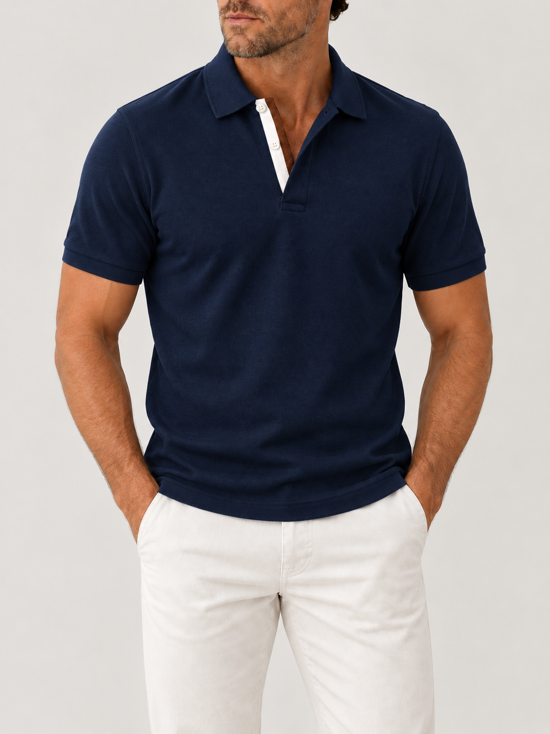 Navy Piqué Polo - Short Sleeve - Regular Fit on model against pale grey background