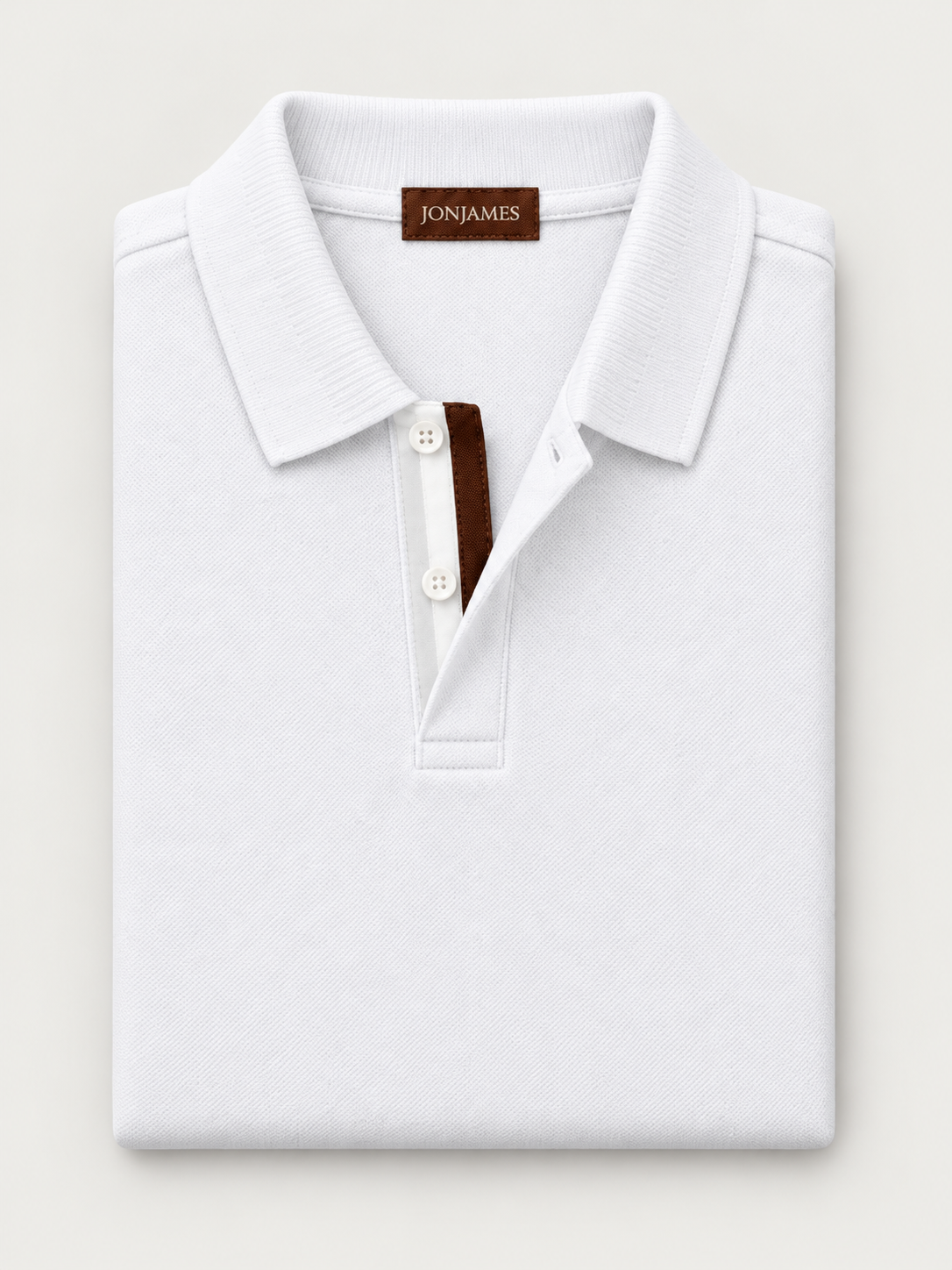 White Piqué Polo - Long Sleeve - Regular Fit folded on pale grey background