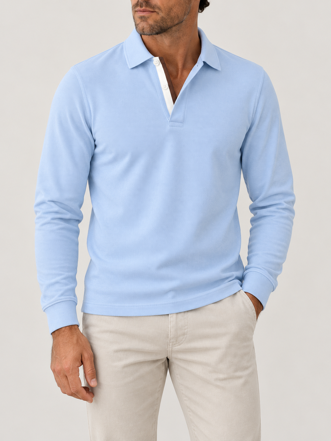 Sky Piqué Polo - Long Sleeve - Regular Fit on model against pale grey background
