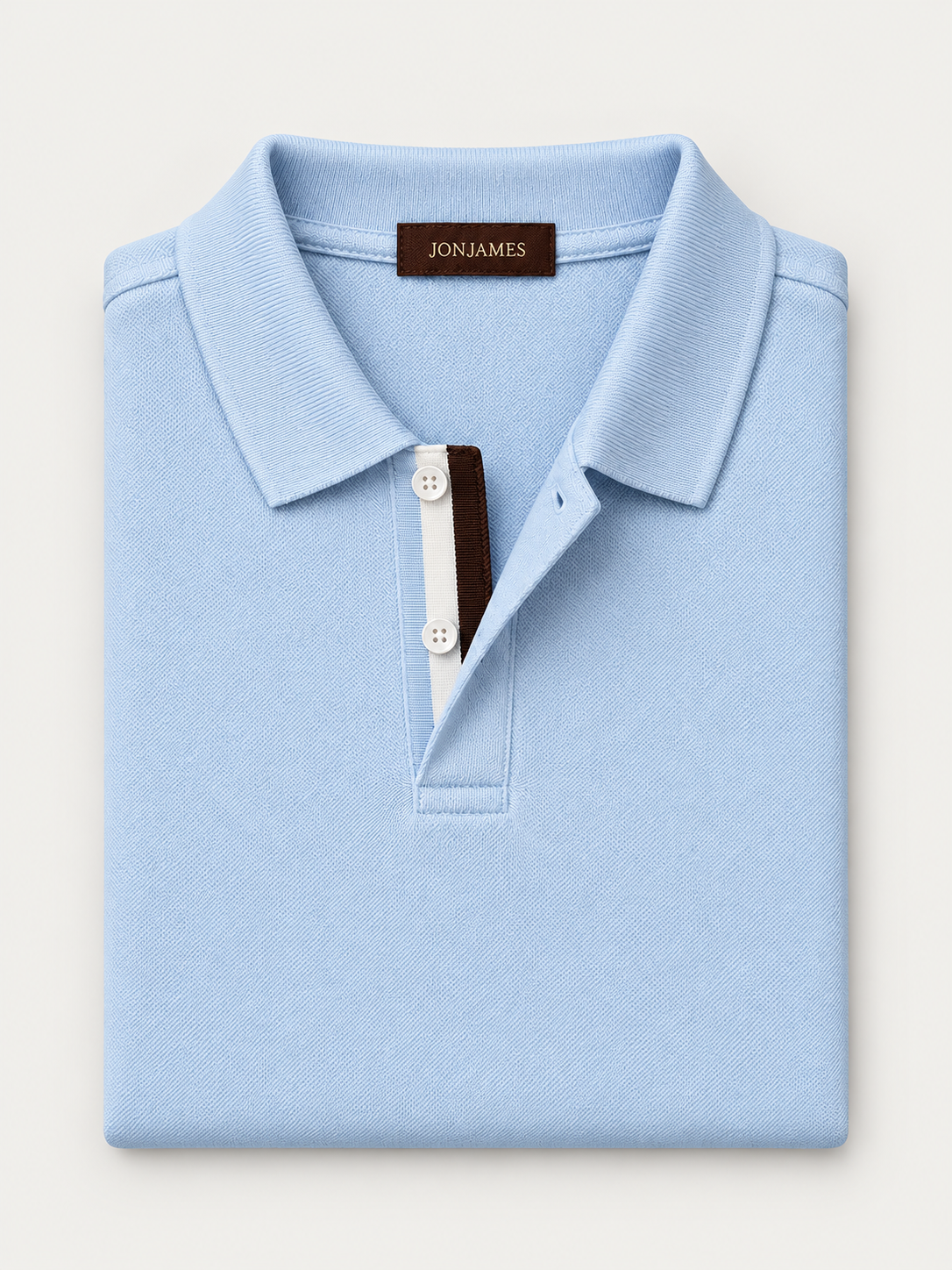 Sky Piqué Polo - Short Sleeve - Regular Fit folded on pale grey background