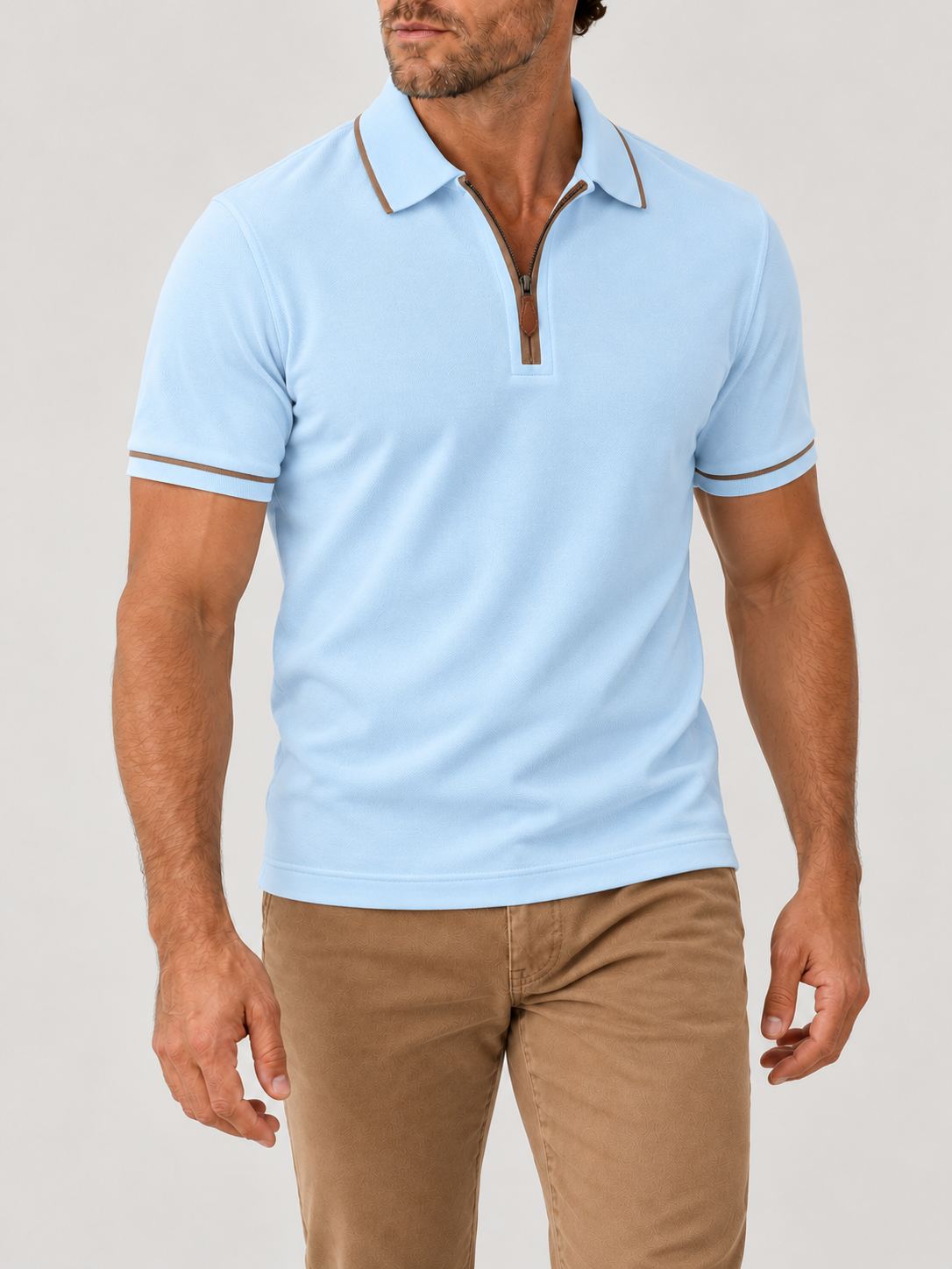 Sky Riviera Performance Polo on model against pale grey background