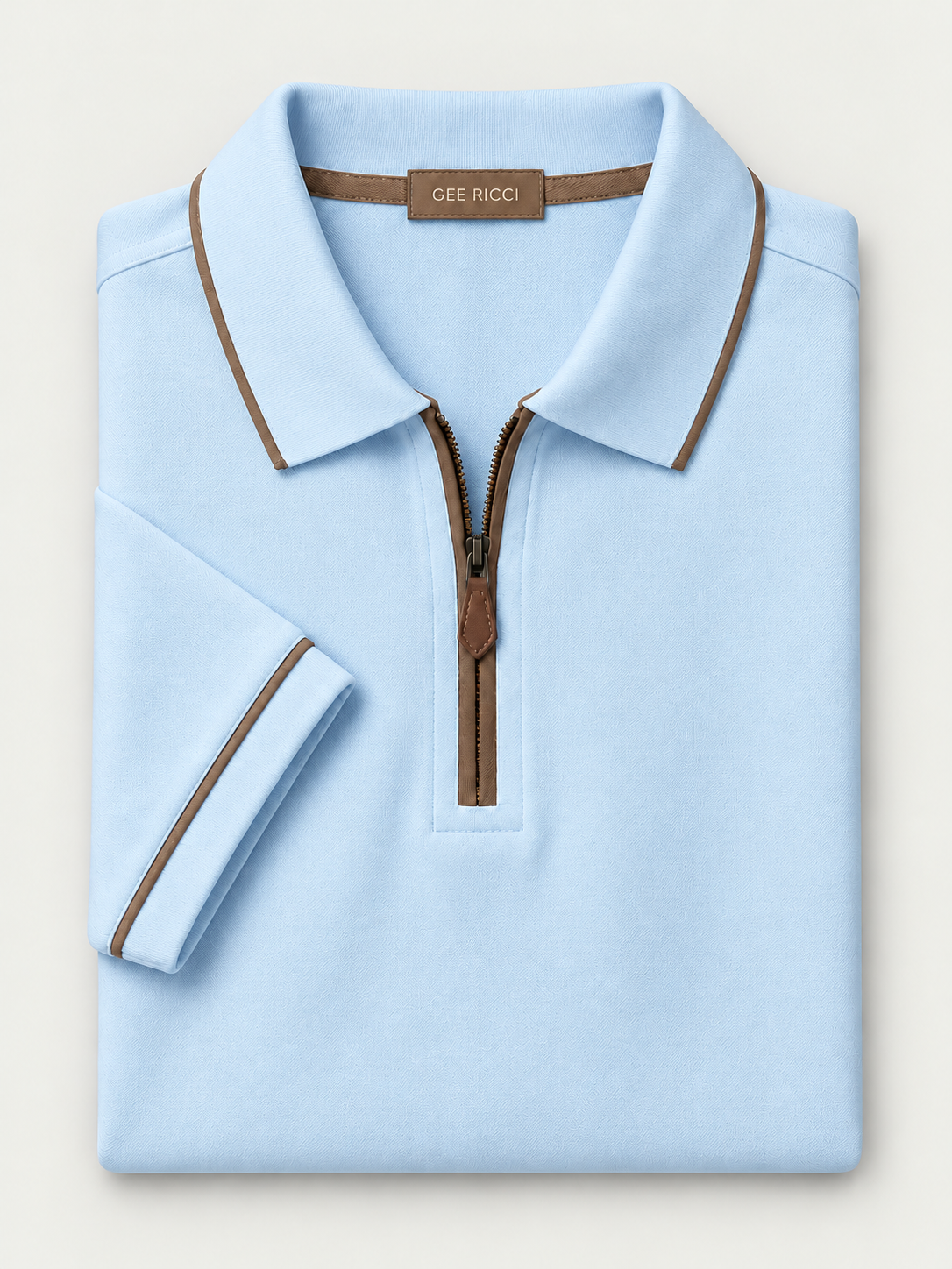 Sky Riviera Performance Polo folded on pale grey background