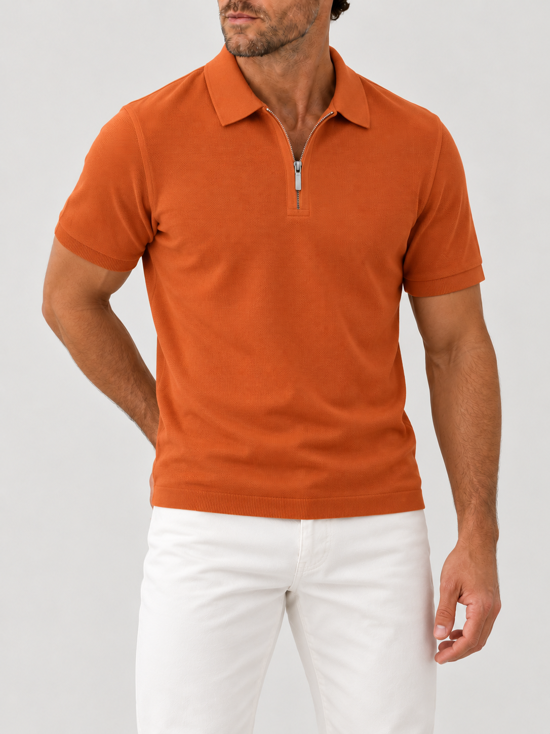 Terracotta Knit Polo - Regular Fit on model against pale grey background