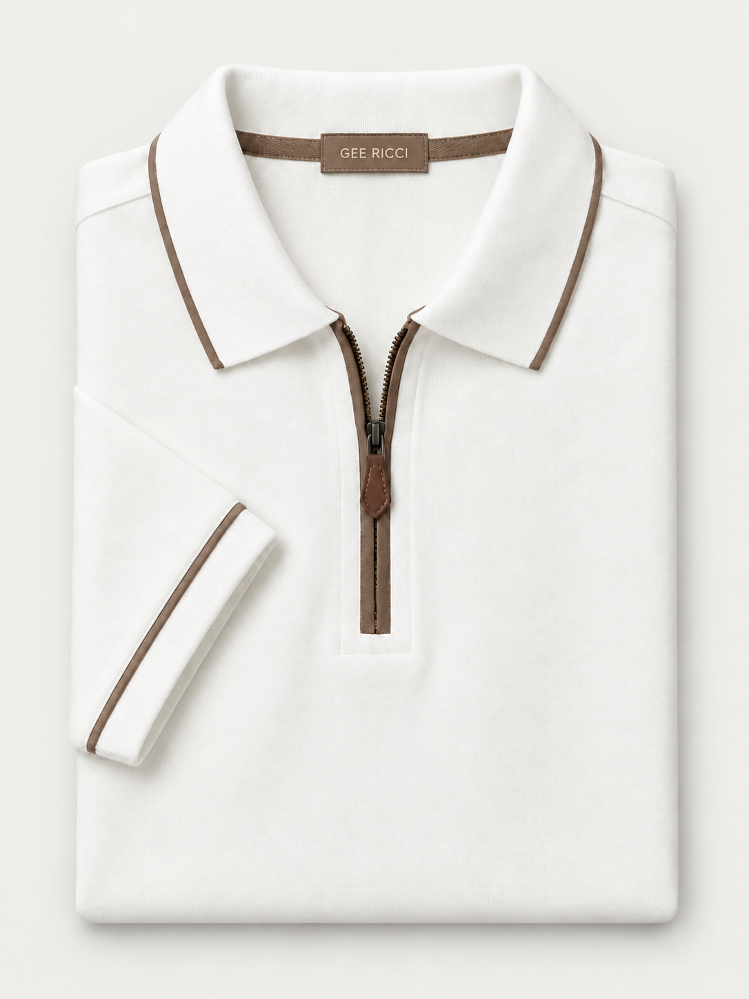 White Riviera Performance Polo – folded polo on pale grey background